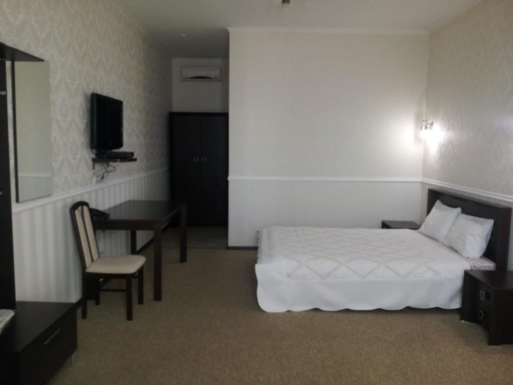 Noy Hotel Charkiw Zimmer foto